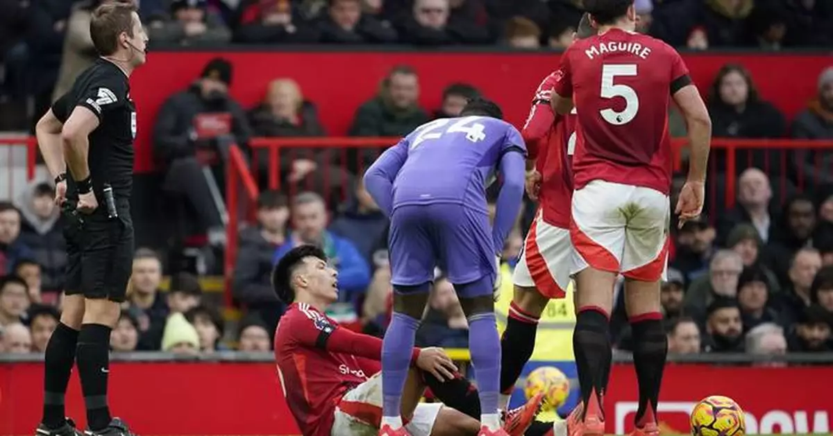 Man United defender Martinez in tears as he is carried off on stretcher with 'serious' knee injury