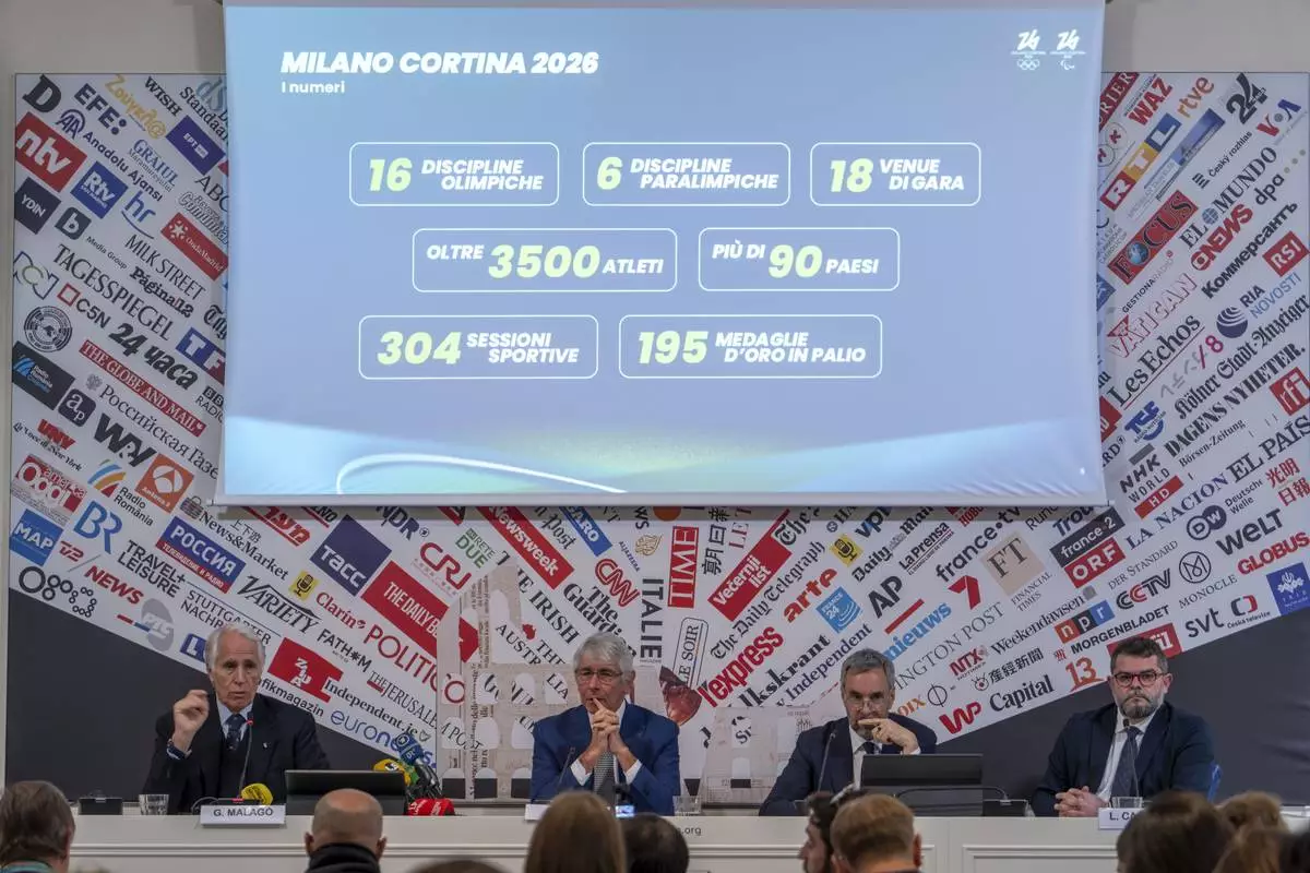 From left, Milano Cortina 2026 Foundation President Giovanni Malago, Italian Minister of Sports Andrea Bodi, Foundation CEO Andrea Vernier, and Foundation Communications Director Luca Casassa, attend a press conference at the Foreign Press Club in Rome, Tuesday, Feb. 18, 2025, on the next Winter Olympic Games that will start in Italy in February 2026. (AP Photo/Domenico Stinellis)