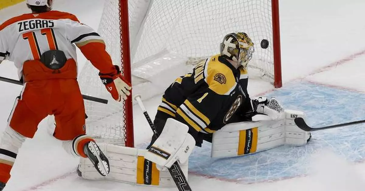 Ducks beat Bruins 3-2 in overtime for fourth straight win. Goalie Gibson leaves with injury
