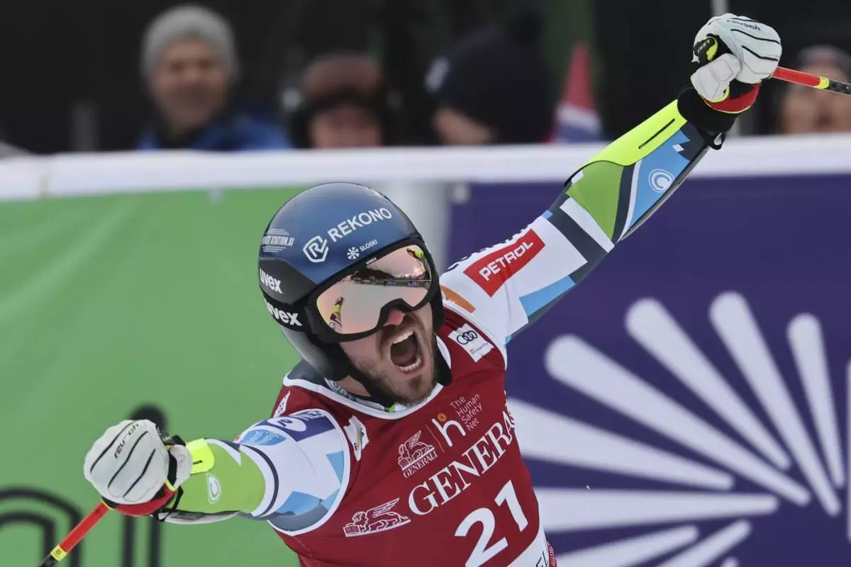 Slovenia's Miha Hrobat reacts after completing an alpine ski, men's World Cup downhill, in Kvitfjell, Norway, Saturday, March 8, 2025. (AP Photo/Marco Trovati)