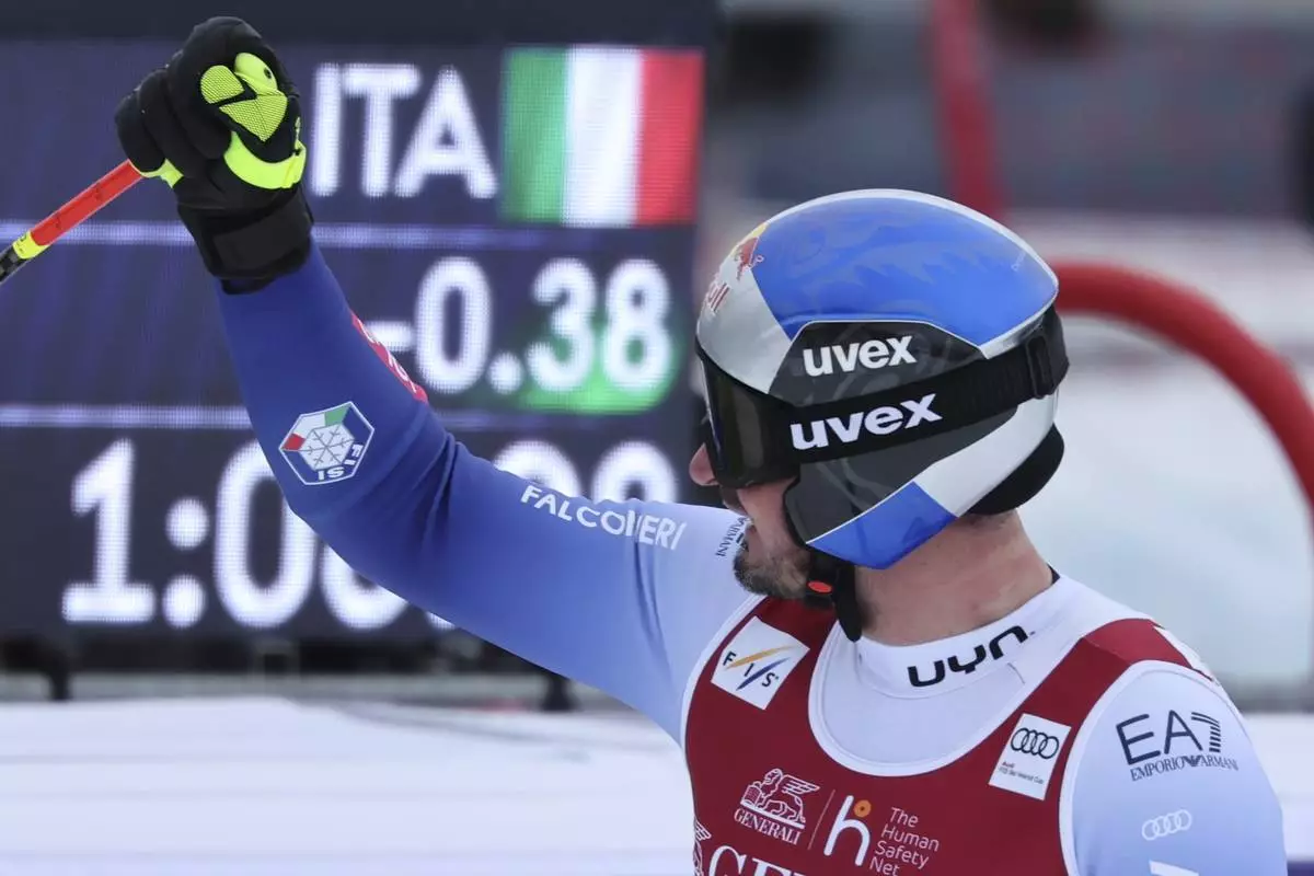 Italy's Dominik Paris reacts after completing an alpine ski, men's World Cup downhill, in Kvitfjell, Norway, Saturday, March 8, 2025. (AP Photo/Marco Trovati)