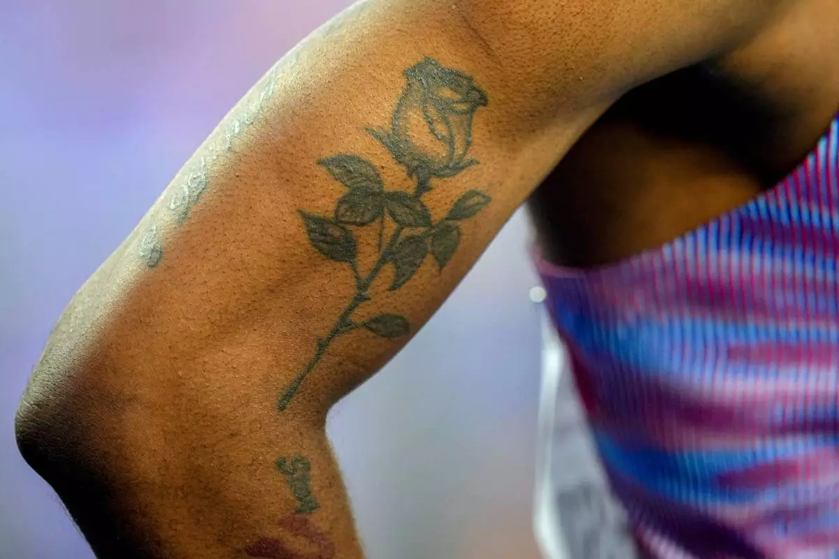 Jacory Patterson stands before the start of 400 meters men's heat during the World Athletics Indoor Championships in Nanjing, China, Friday, March 21, 2025. (AP Photo/Dar Yasin)