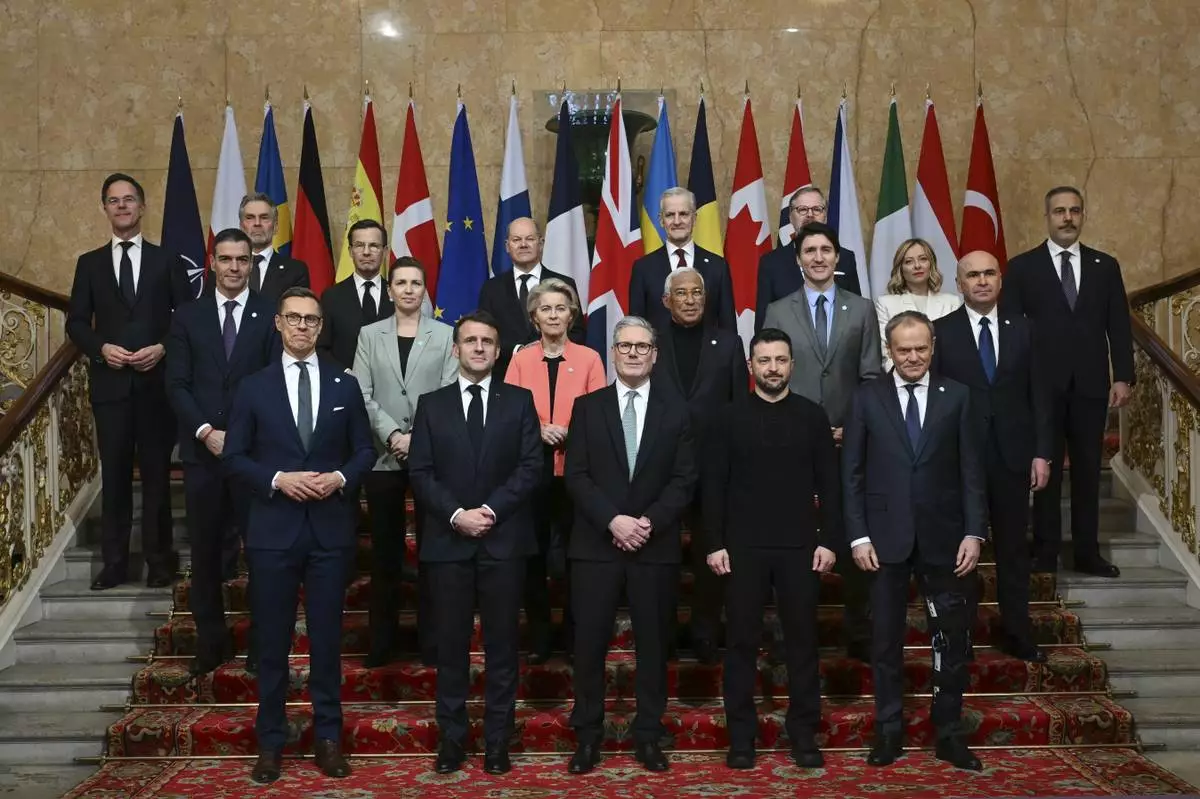 Britain's Prime Minister Keir Starmer, front center, hosts the European leaders' summit to discuss Ukraine, at Lancaster House, London, Sunday March 2, 2025. Front row from left, Finland's President Alexander Stubb, France's President Emmanuel Macron, Britain's Prime Minister Keir Starmer, Ukraine's President Volodymyr Zelenskyy and Poland's Prime Minister Donald Tusk. Center row from left, Spain's Prime Minister Pedro Sanchez, Denmark's Prime Minister Mette Frederiksen, European Commission President Ursula von der Leyen, European Council President Antonio Costa, Canada's Prime Minister Justin Trudeau, and Romania's Interim President Ilie Bolojan. Back row from left, NATO secretary General Mark Rutte, Netherlands' Prime Minister Dick Schoof, Sweden's Prime Minister Ulf Kristersson, Germany's Chancellor Olaf Scholz, Norway's Prime Minister Jonas Gahr Store, Czech Republic's Prime Minister Petr Fiala, Italy's Prime Minister Giorgia Meloni and Turkey's Minister of Foreign Affairs Hakan Fidan. (Justin Tallis/Pool via AP)