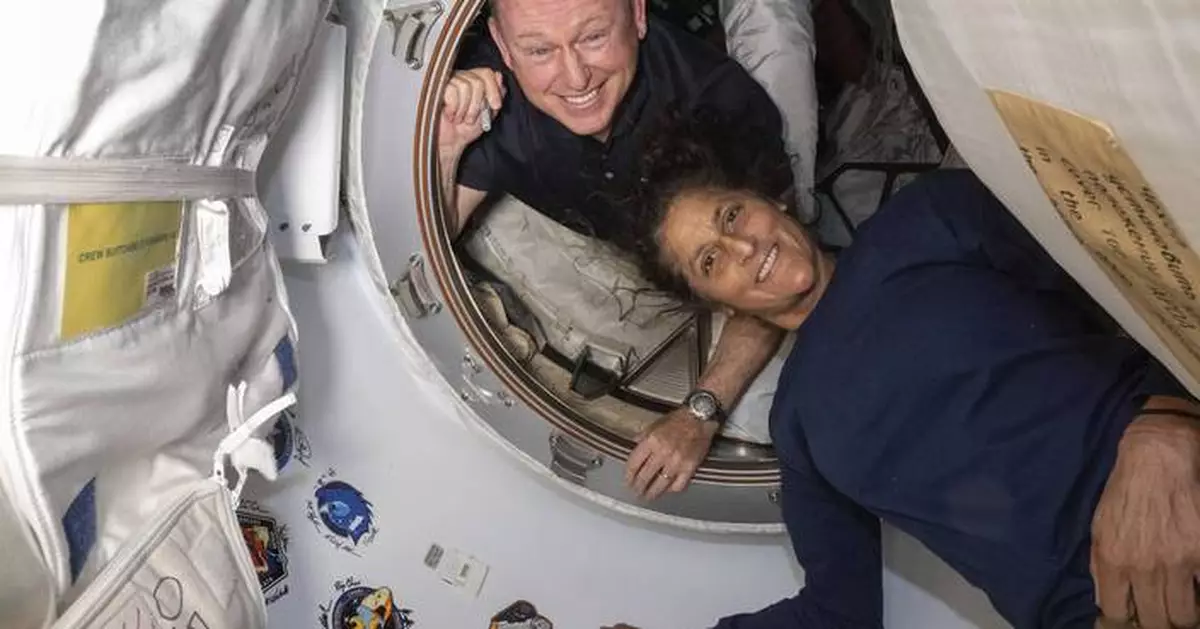 Who are the NASA astronauts who have been stuck in space for 9 months?
