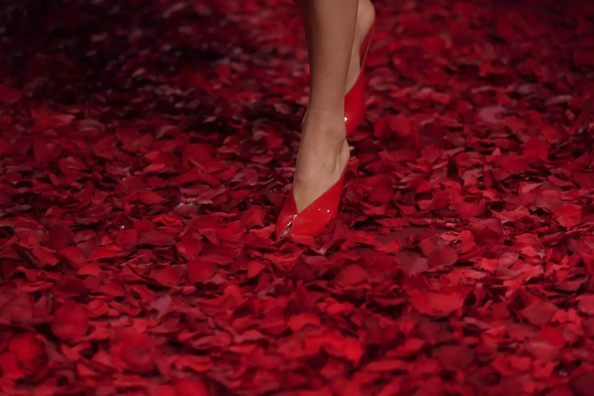 Models wear creations as part of the Ferragamo's Fall/Winter 2025-2026 collection presented in Milan, Italy, Saturday, March 1, 2025. (AP Photo/Antonio Calanni)