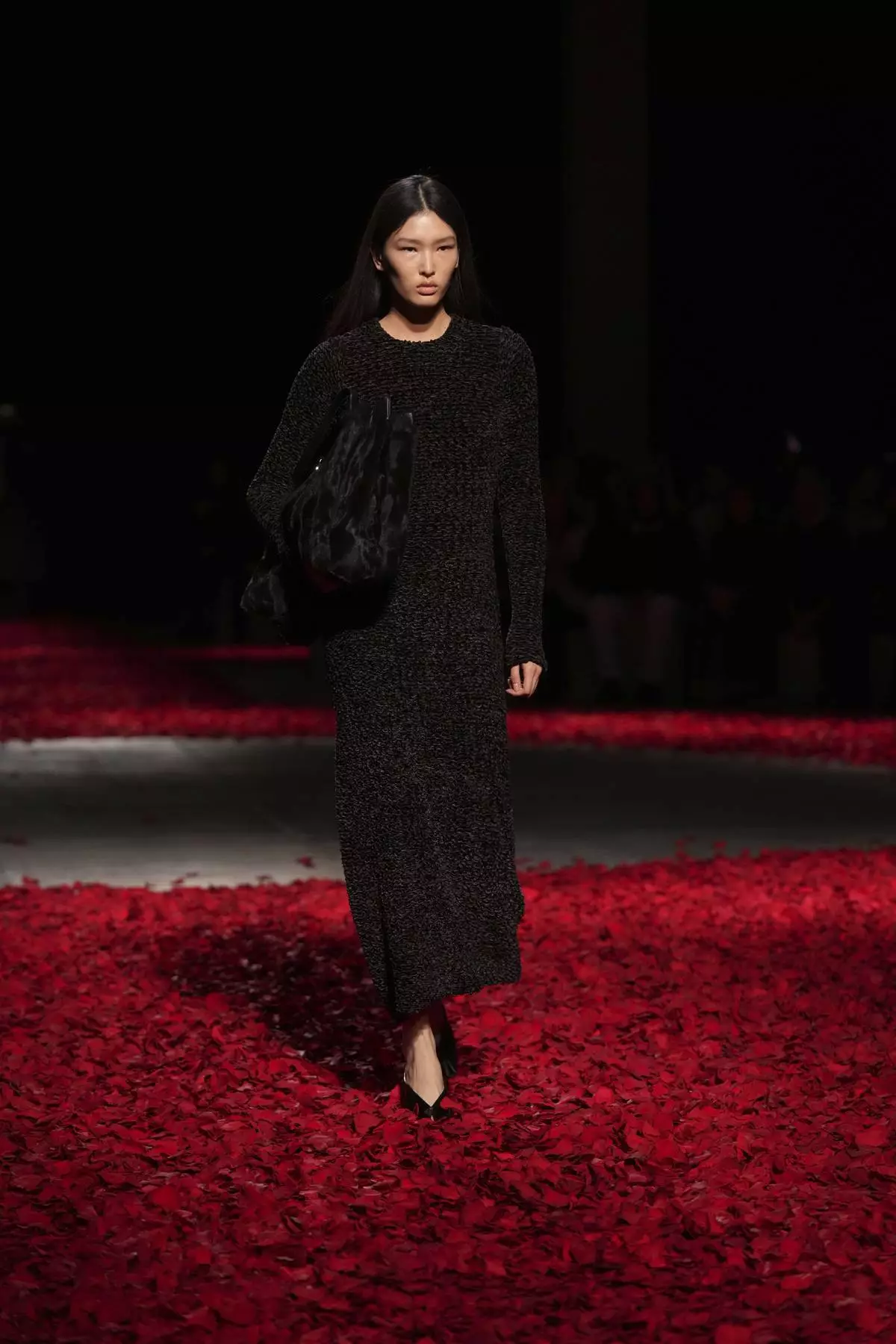 Models wear creations as part of the Ferragamo's Fall/Winter 2025-2026 collection presented in Milan, Italy, Saturday, March 1, 2025. (AP Photo/Antonio Calanni)