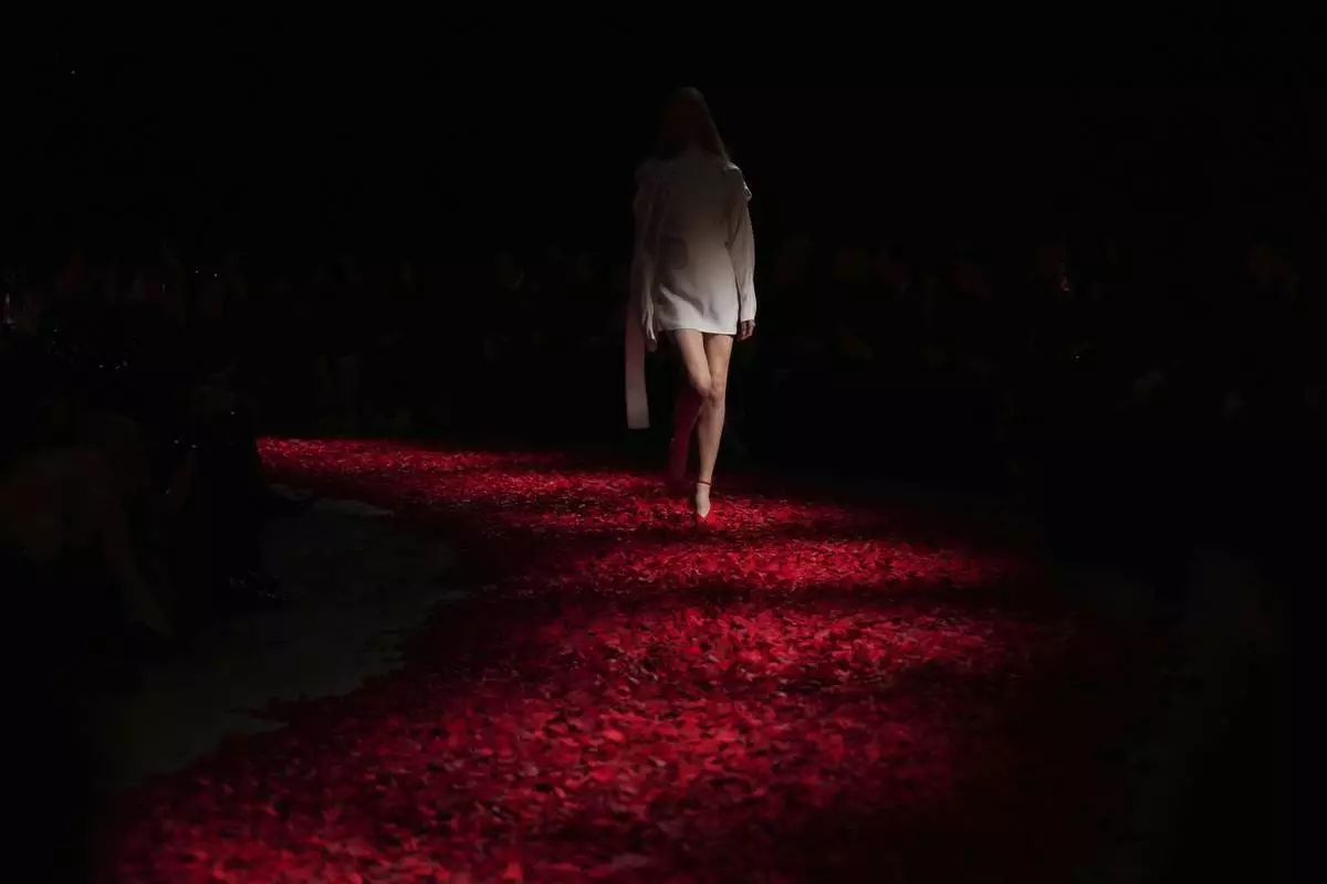 Models wear creations as part of the Ferragamo's Fall/Winter 2025-2026 collection presented in Milan, Italy, Saturday, March 1, 2025. (AP Photo/Antonio Calanni)