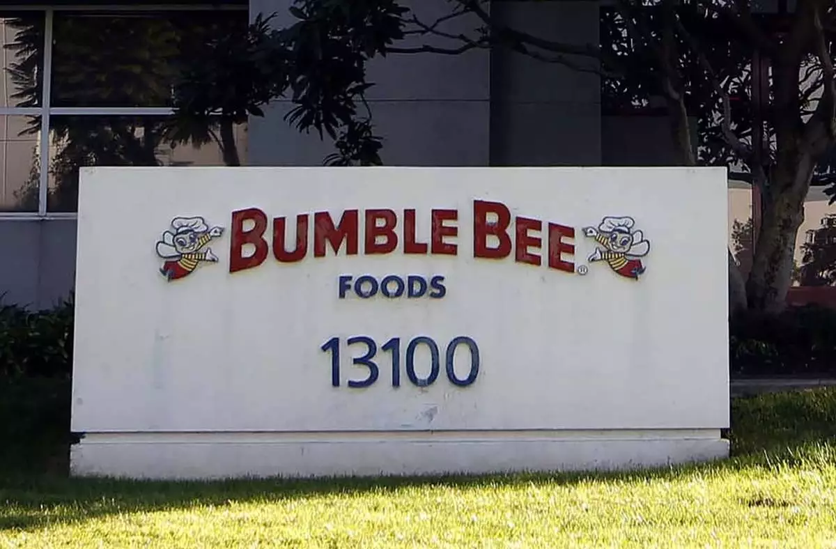 FILE - This Oct. 15, 2012 file photo shows the front of the Bumble Bee tuna processing plant in Santa Fe Springs, Calif. (AP Photo/Nick Ut, file)