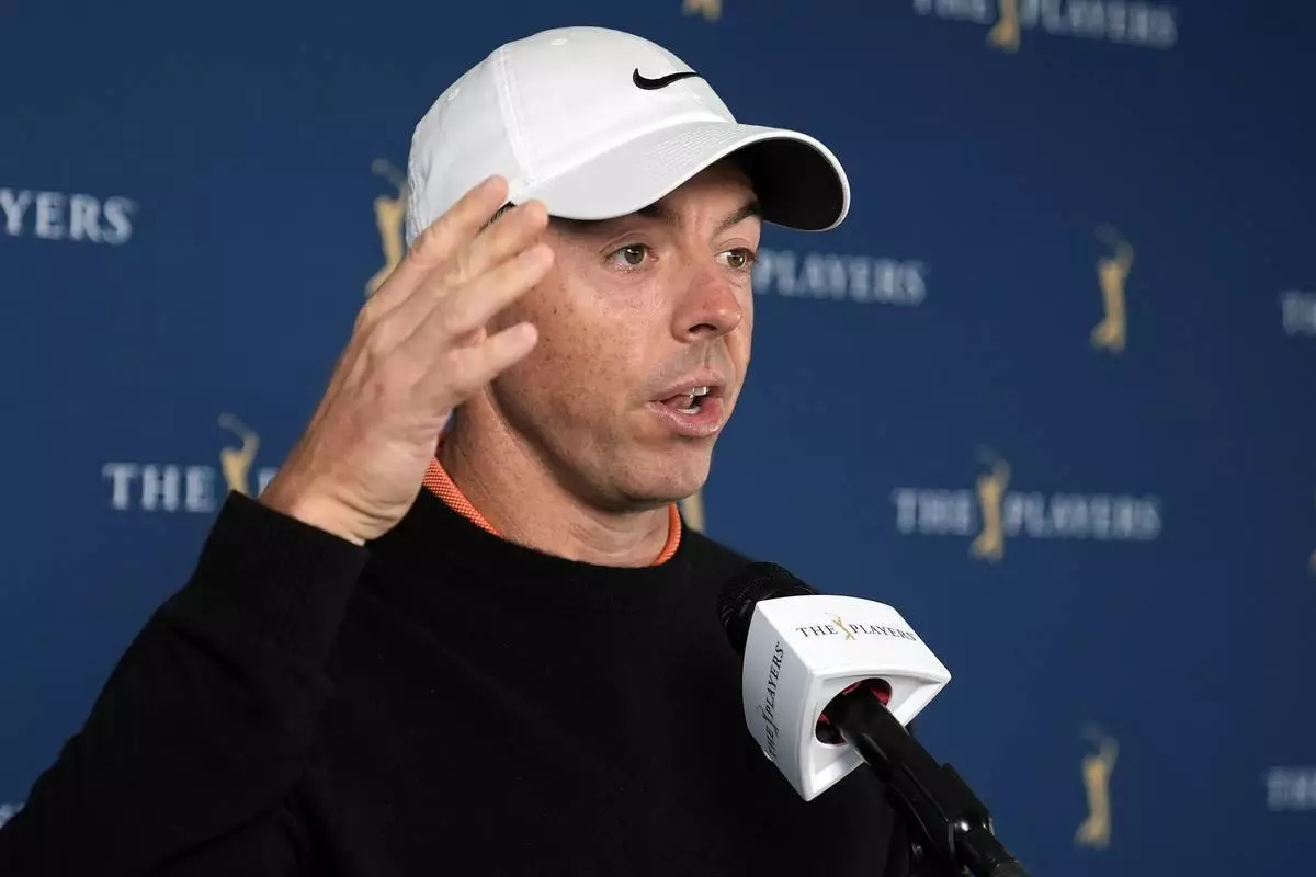 Rory McIlroy, of Northern Ireland, speaks to the media before a practice round of The Players Championship golf tournament Wednesday, March 12, 2025, in Ponte Vedra Beach, Fla. (AP Photo/Chris O'Meara)