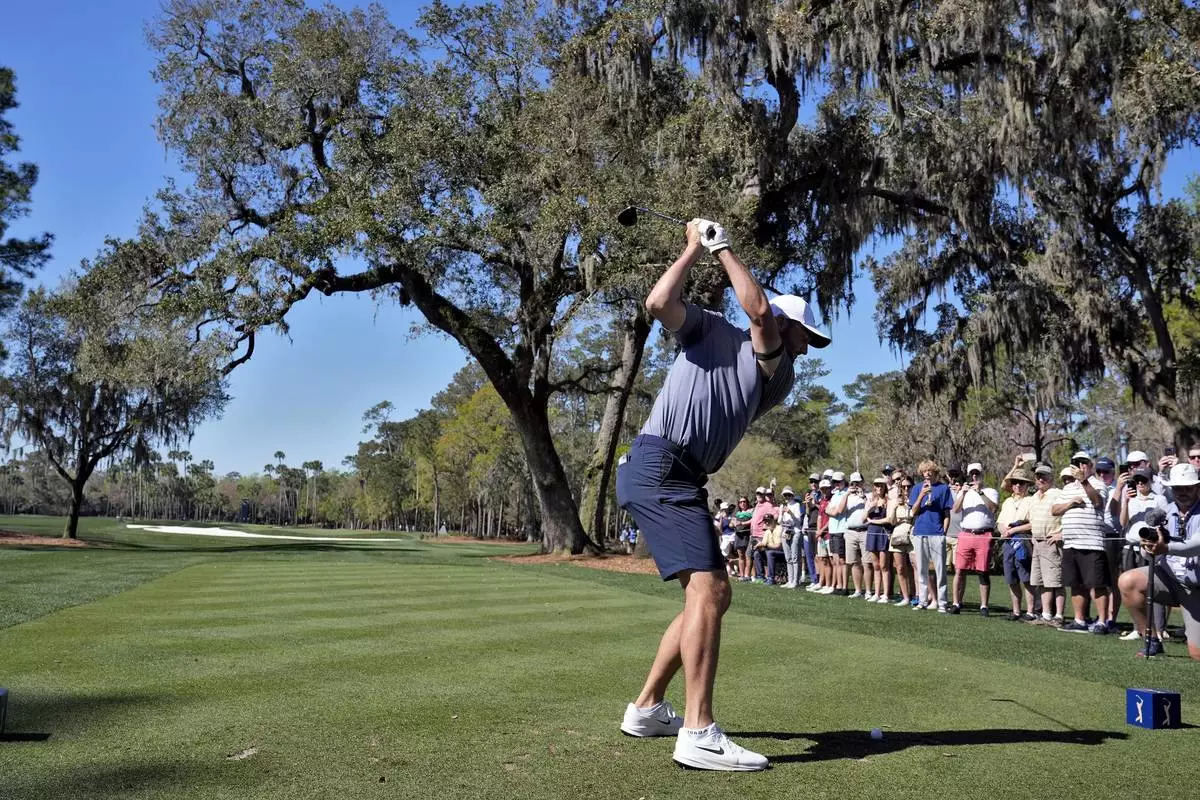 Scottie Scheffler tees off on the sixth hole during a practice round at The Players Championship golf tournament Wednesday, March 12, 2025, in Ponte Vedra Beach, Fla. (AP Photo/Chris O'Meara)