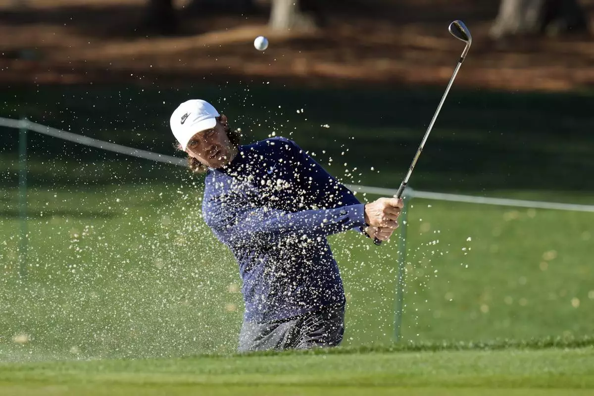 Tommy Fleetwood, of England, blasts from the sand on the 15th hole during a practice round of The Players Championship golf tournament Wednesday, March 12, 2025, in Ponte Vedra Beach, Fla. (AP Photo/Chris O'Meara)