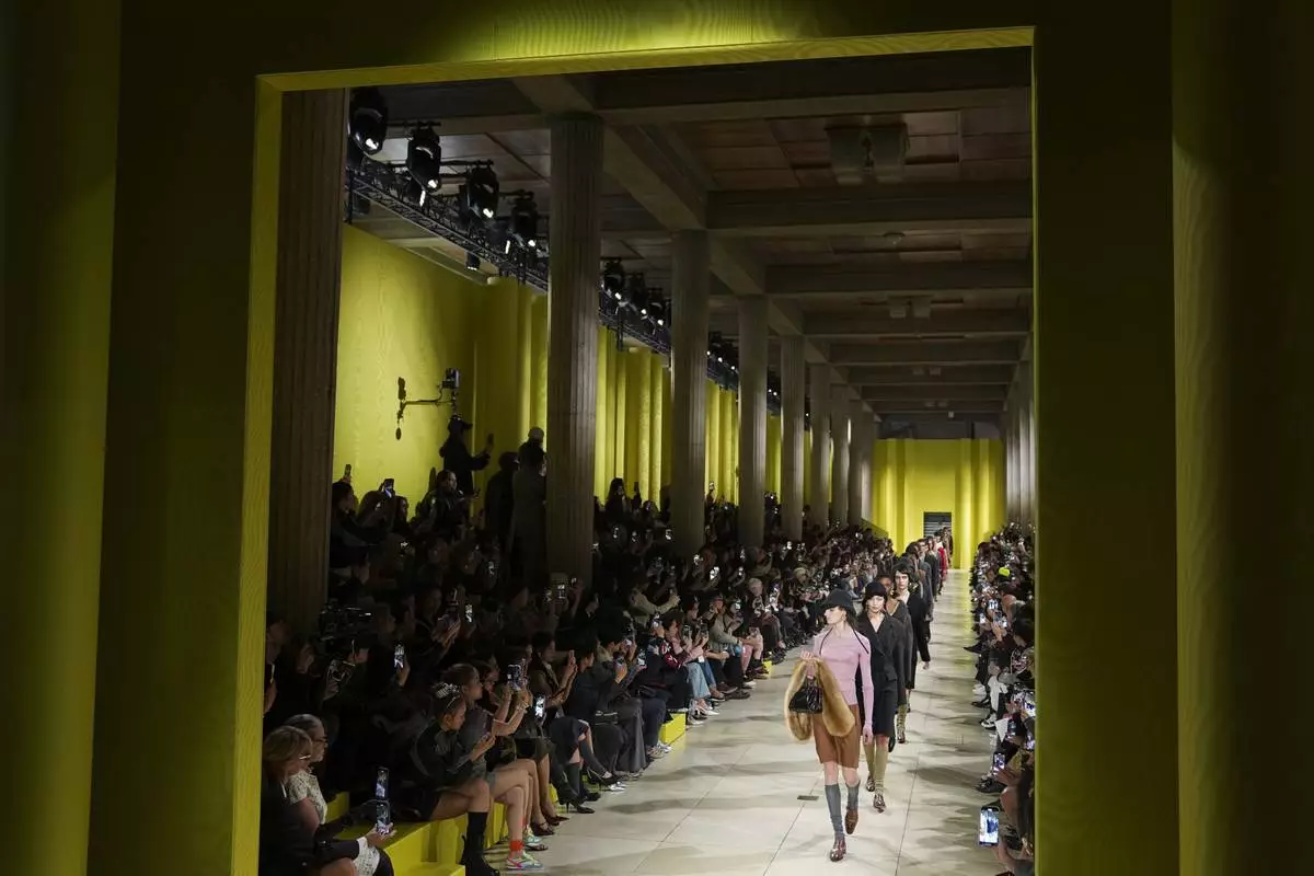 Models wear creations as part of the Miu Miu Fall/Winter 2025-2026 Womenswear collection presented Tuesday, March 11, 2025. in Paris. (Photo by Scott A Garfitt/Invision/AP)