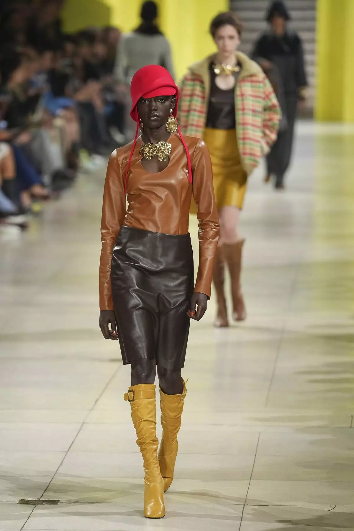 A model wears a creation as part of the Miu Miu Fall/Winter 2025-2026 Womenswear collection presented Tuesday, March 11, 2025. in Paris. (Photo by Scott A Garfitt/Invision/AP)