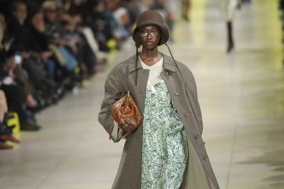 A model wears a creation as part of the Miu Miu Fall/Winter 2025-2026 Womenswear collection presented Tuesday, March 11, 2025. in Paris. (Photo by Scott A Garfitt/Invision/AP)