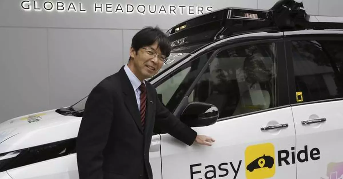 Japan's Nissan tests driverless vehicles in city streets filled with cars and people