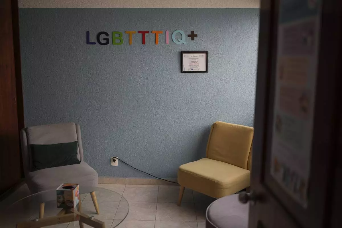 The sun shines into a room at Casa Frida, a shelter that supports LGBTQ+ migrants, in Mexico City, Tuesday, Feb. 18, 2025. (AP Photo/Eduardo Verdugo)