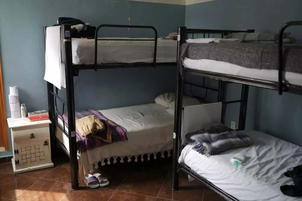 Bunk beds lie in a room at Casa Frida, a shelter that supports LGBTQ+ migrants, in Mexico City, Tuesday, Feb. 18, 2025. (AP Photo/Eduardo Verdugo)