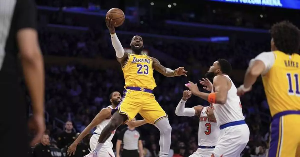 Doncic and James propel Lakers to 113-109 overtime victory over Knicks for 8th straight win