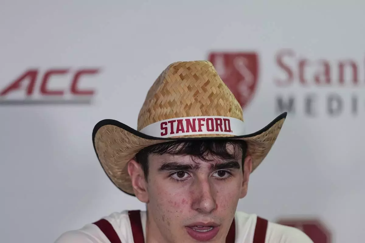 Stanford forward Maxime Raynaud talks to reporters during a press conference, following the team's victory over California in an NCAA college basketball game Saturday, Feb. 22, 2025, in Stanford, Calif. (AP Photo/Godofredo A. Vásquez)