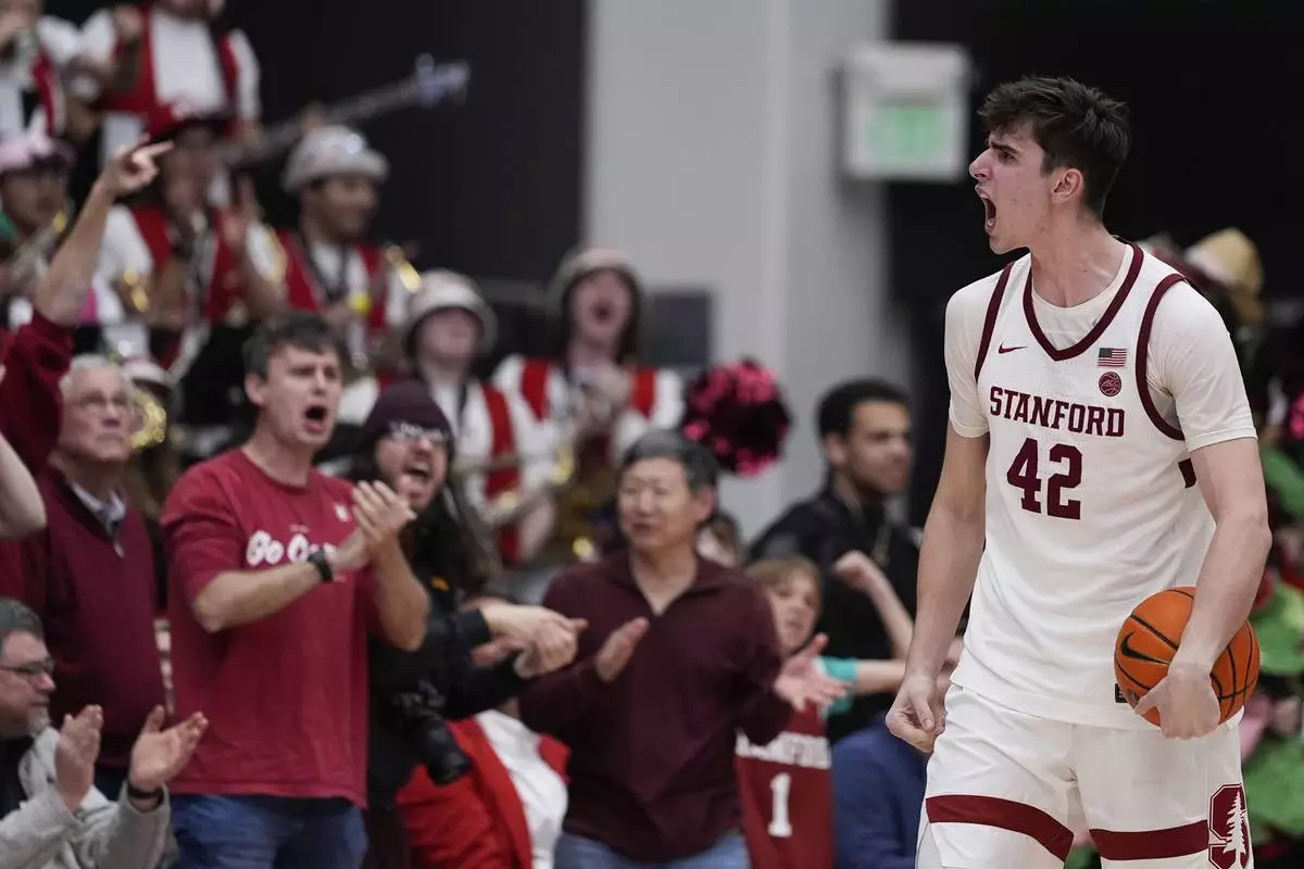 Stanford forward Maxime Raynaud (42) reacts after a defensive stop against California during the second half of an NCAA college basketball game Saturday, Feb. 22, 2025, in Stanford, Calif. (AP Photo/Godofredo A. Vásquez)