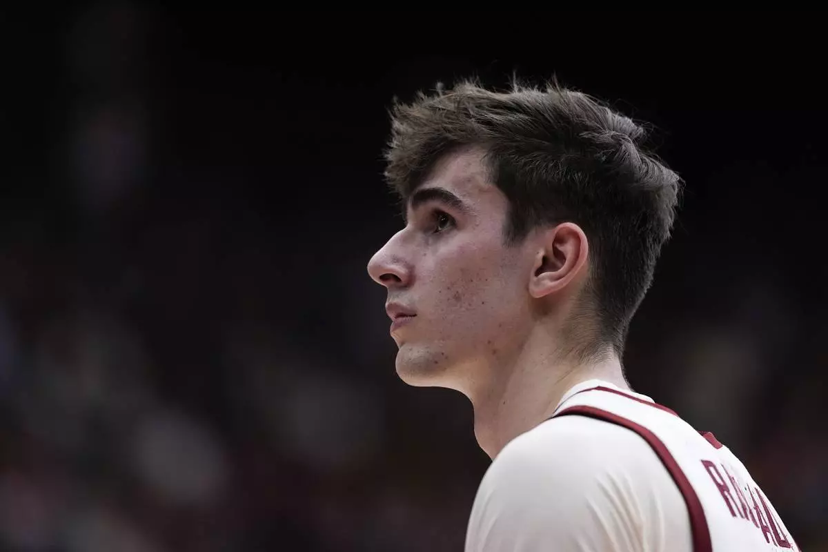 Stanford forward Maxime Raynaud looks up while standing on the court during the second half of an NCAA college basketball game against California, Saturday, Feb. 22, 2025, in Stanford, Calif. (AP Photo/Godofredo A. Vásquez)