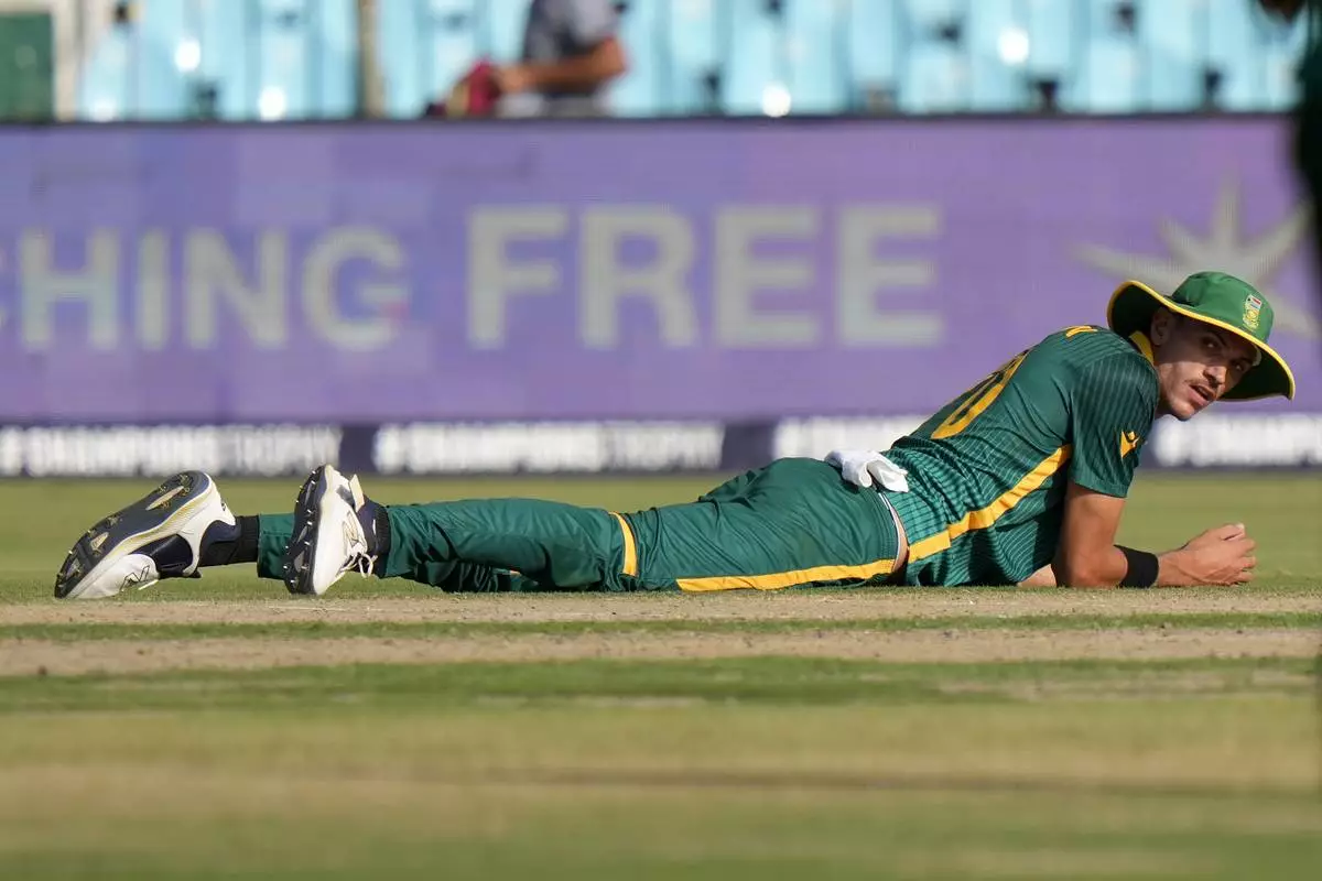 South Africa's Marco Jansen reacts after taking the catch of England's Jofra Archer during the ICC Champions Trophy cricket match between England and South Africa, in Karachi, Pakistan Saturday, March 1, 2025. (AP Photo/Anjum Naveed)