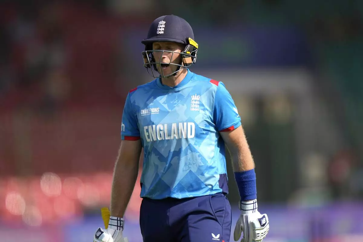 England's Joe Root reacts as he walks off the field after his dismissal during the ICC Champions Trophy cricket match between England and South Africa, in Karachi, Pakistan Saturday, March 1, 2025. (AP Photo/Anjum Naveed)