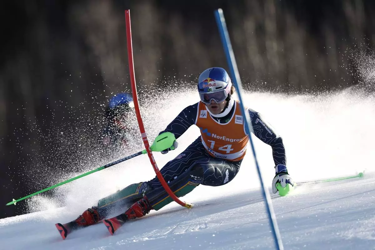 Brazil's Lucas Pinheiro Braathen competes in an alpine ski, men's World Cup slalom, in Hafjell, Norway, Sunday, March 16, 2025. (AP Photo/Gabriele Facciotti)