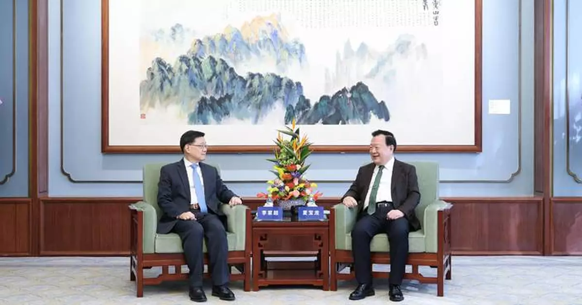 Central Government Supports Hong Kong's Development at National People's Congress Meeting with Chief Executive John Lee