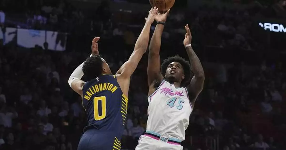 Mitchell hits big 3, Herro scores 29 and Heat dig deep to top Pacers 125-120