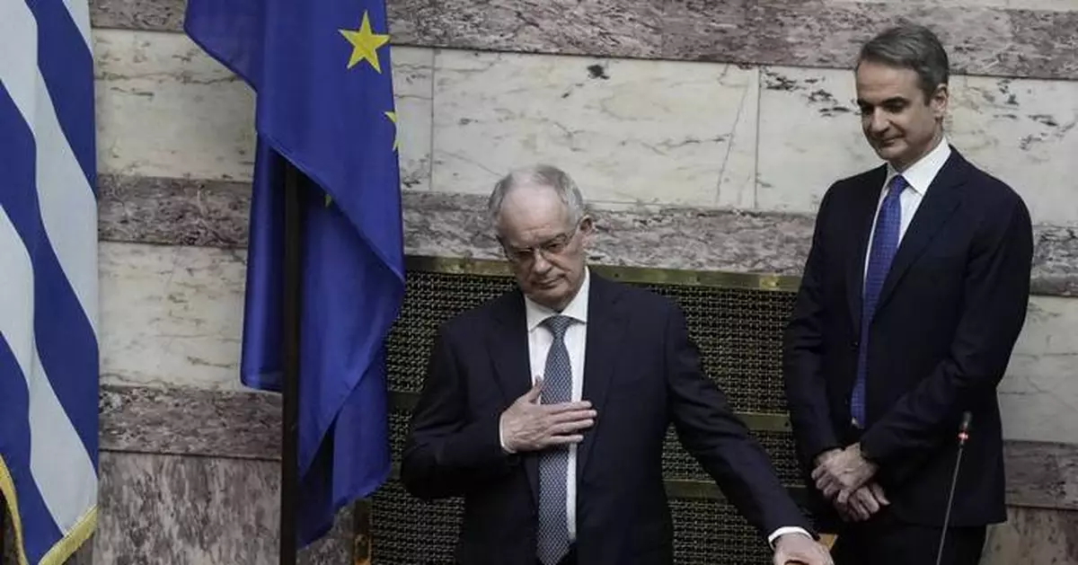 A veteran conservative lawmaker is sworn in as Greece’s new president
