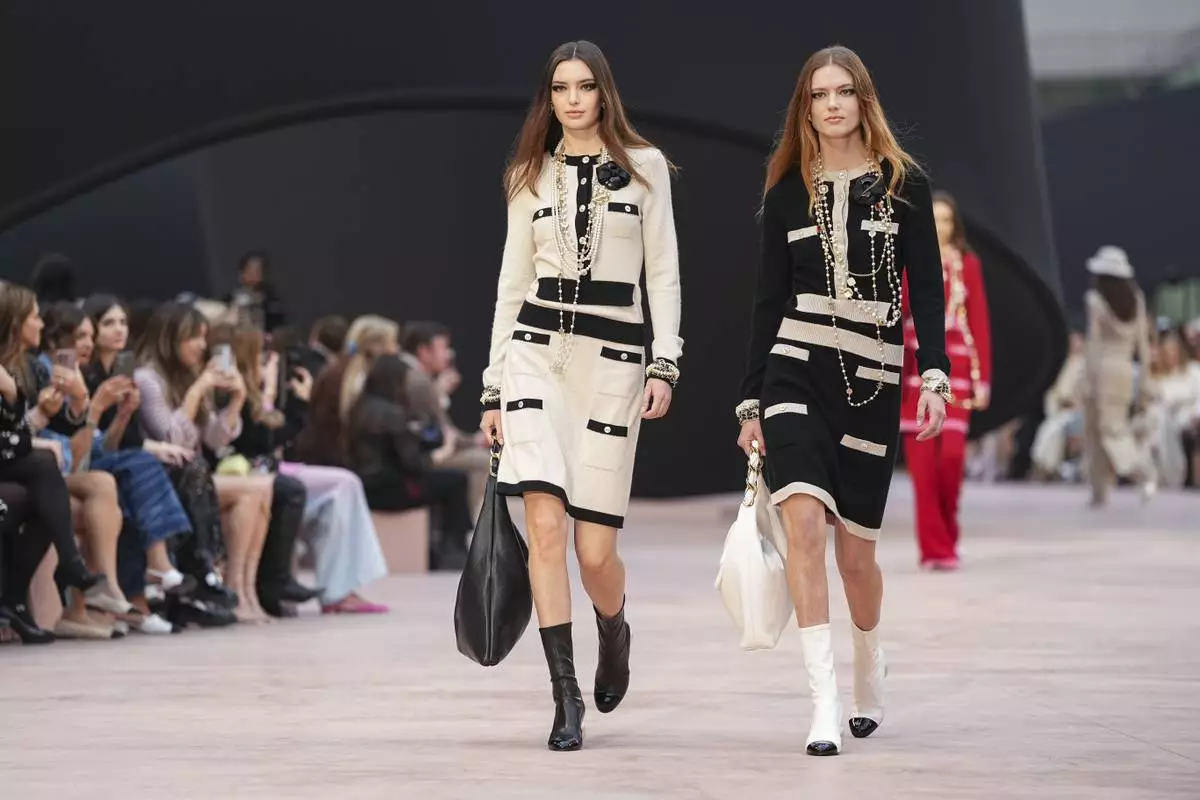 Models wear creations as part of the Chanel Fall/Winter 2025-2026 Womenswear collection presented Tuesday, March 11, 2025. in Paris. (Photo by Scott A Garfitt/Invision/AP)