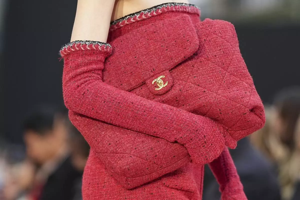 A model wears a creation as part of the Chanel Fall/Winter 2025-2026 Womenswear collection presented Tuesday, March 11, 2025. in Paris. (Photo by Scott A Garfitt/Invision/AP)
