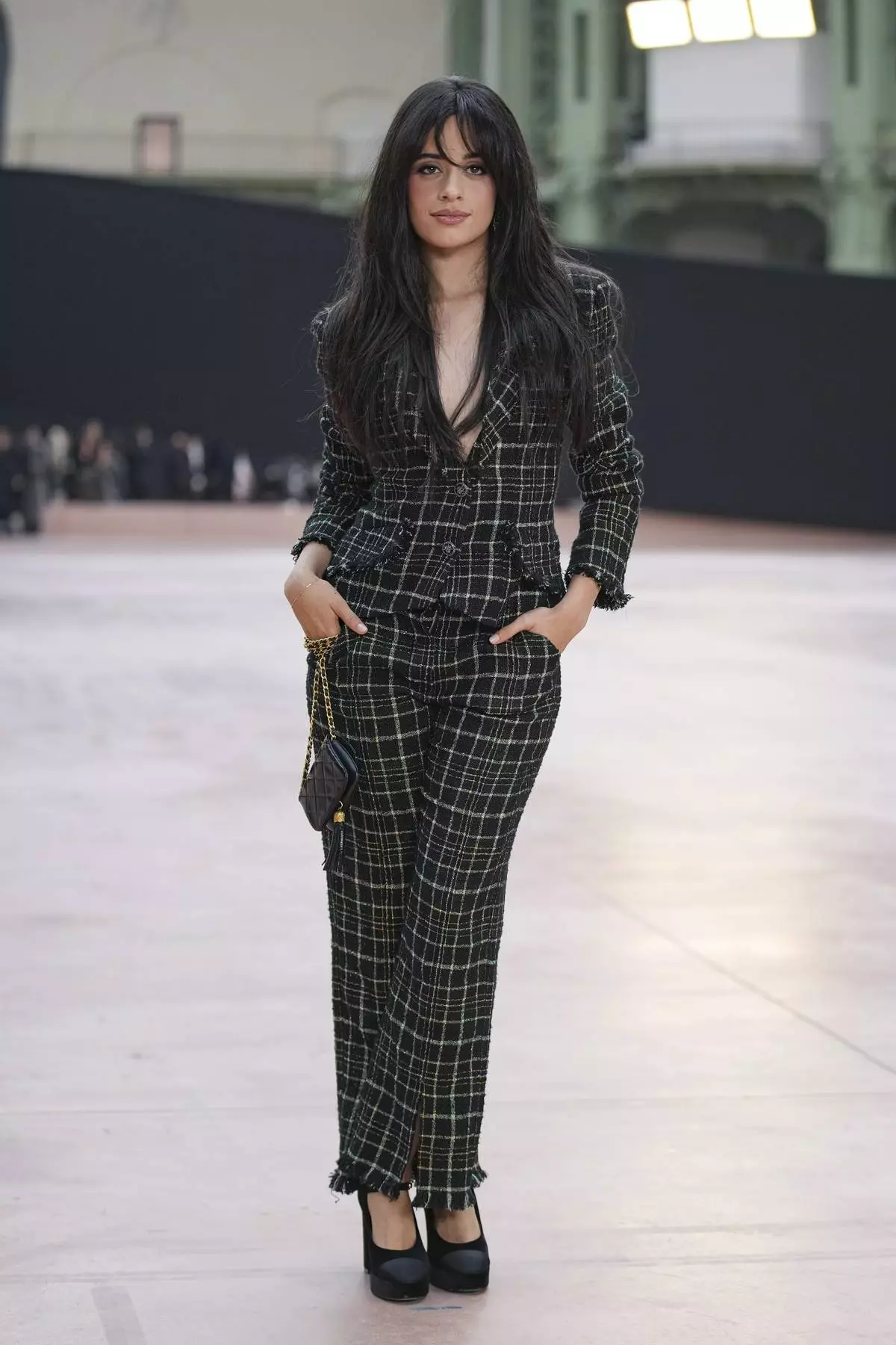 Camila Cabello arrives for the the Chanel Fall/Winter 2025-2026 Womenswear collection presented Tuesday, March 11, 2025. in Paris. (AP Photo/Christophe Ena).