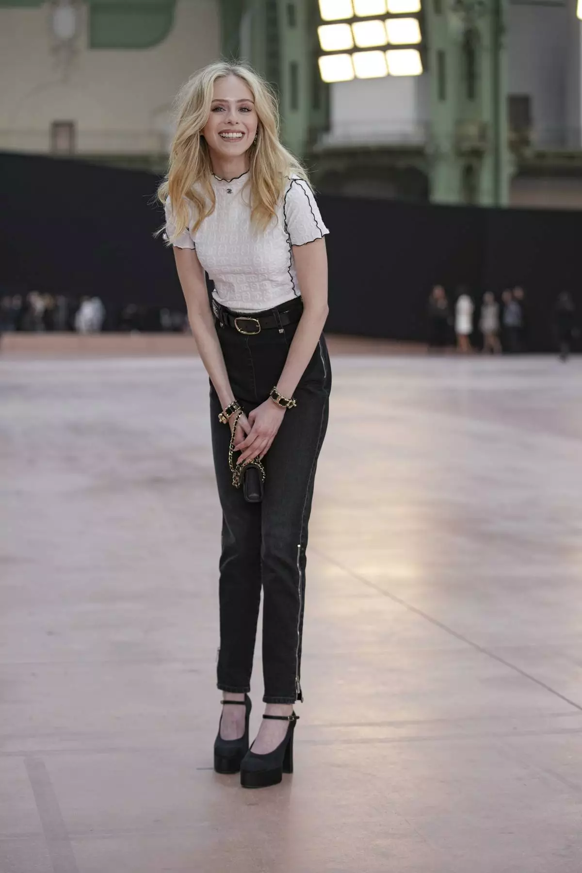 Loreta Peralta arrives for the the Chanel Fall/Winter 2025-2026 Womenswear collection presented Tuesday, March 11, 2025. in Paris. (AP Photo/Christophe Ena).