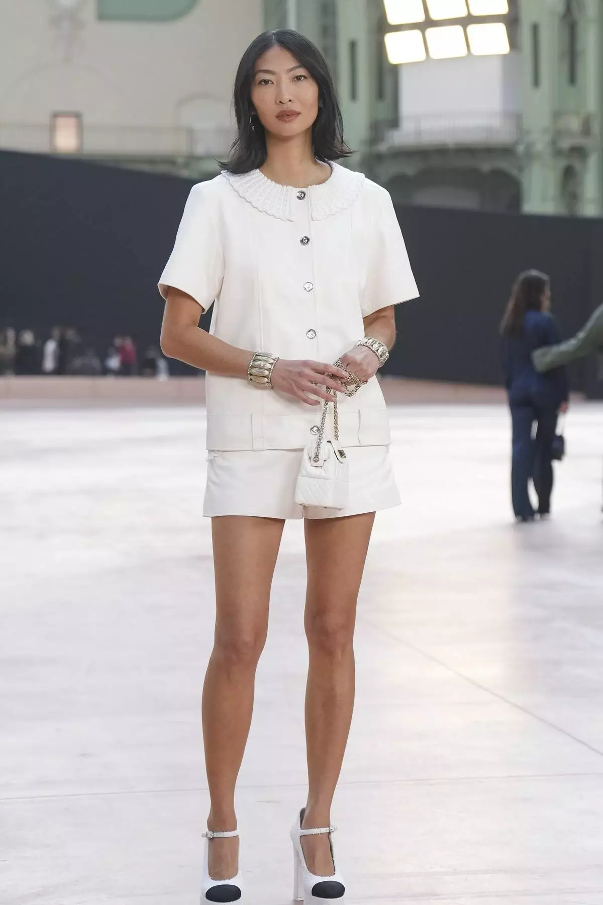 Constance Tsang arrives for the the Chanel Fall/Winter 2025-2026 Womenswear collection presented Tuesday, March 11, 2025. in Paris. (AP Photo/Christophe Ena).