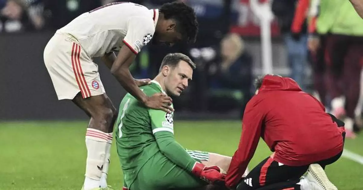 Bayern goalkeeper Manuel Neuer injures himself while celebrating a goal