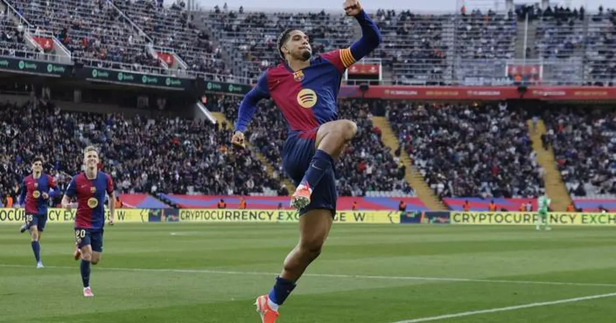 Barcelona routs 10-man Real Sociedad 4-0 to go top in Spain