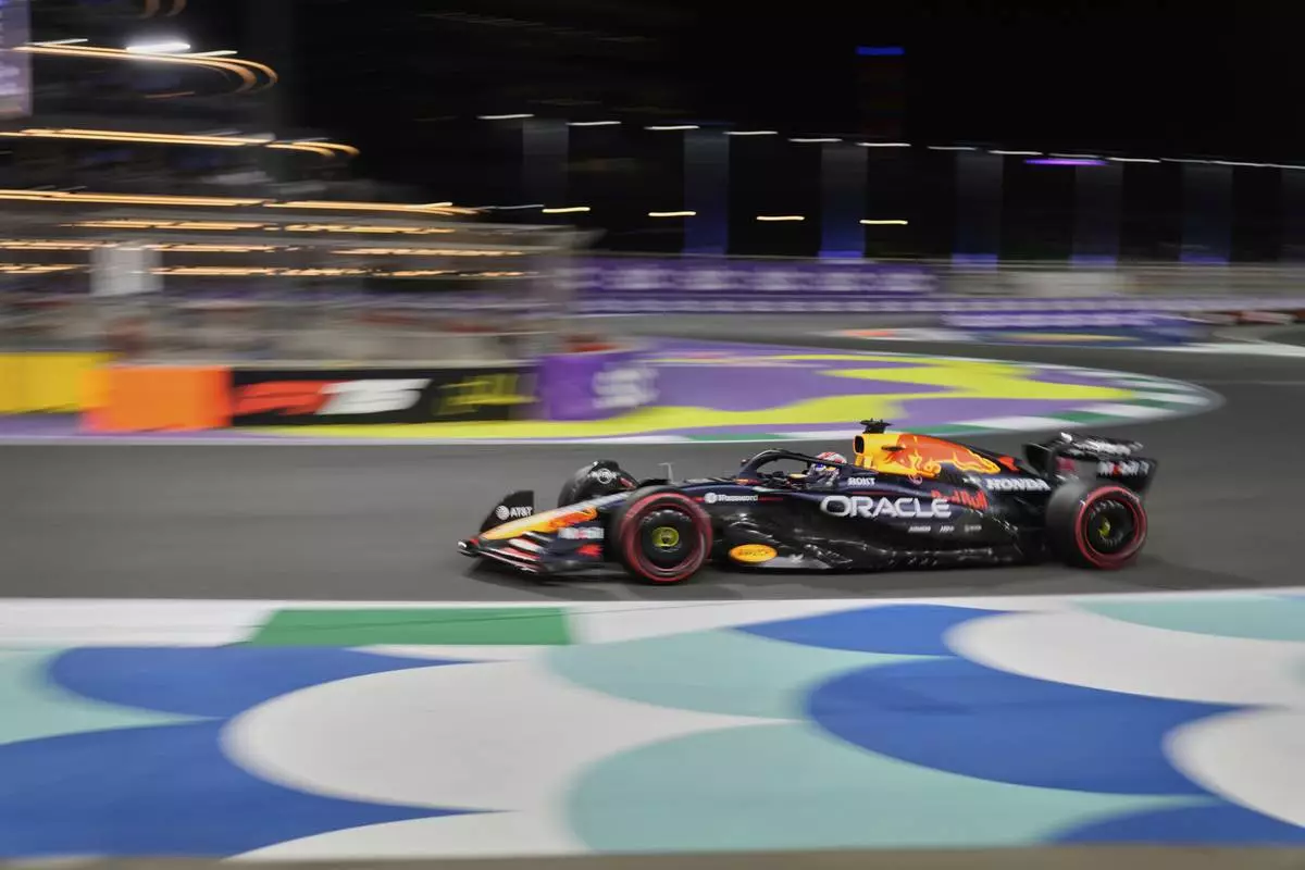 Red Bull driver Max Verstappen of the Netherlands steers his car during the qualifying session ahead of the Formula One Saudi Arabian Grand Prix at the Jeddah Corniche Circuit in Jeddah, Saudi Arabia, Saturday, April 19, 2025. (AP Photo/Darko Bandic)