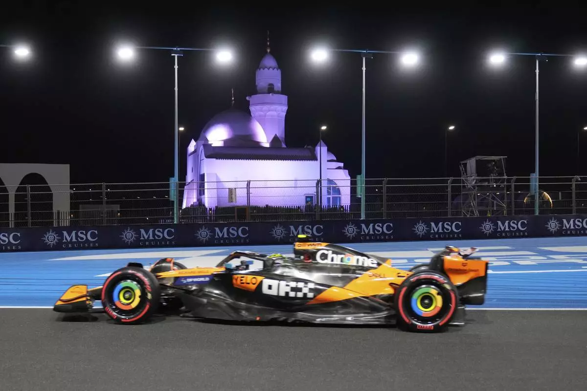 McLaren driver Lando Norris of Britain steers his car during the qualifying session ahead of the Formula One Saudi Arabian Grand Prix at the Jeddah Corniche Circuit in Jeddah, Saudi Arabia, Saturday, April 19, 2025. (AP Photo/Darko Bandic)