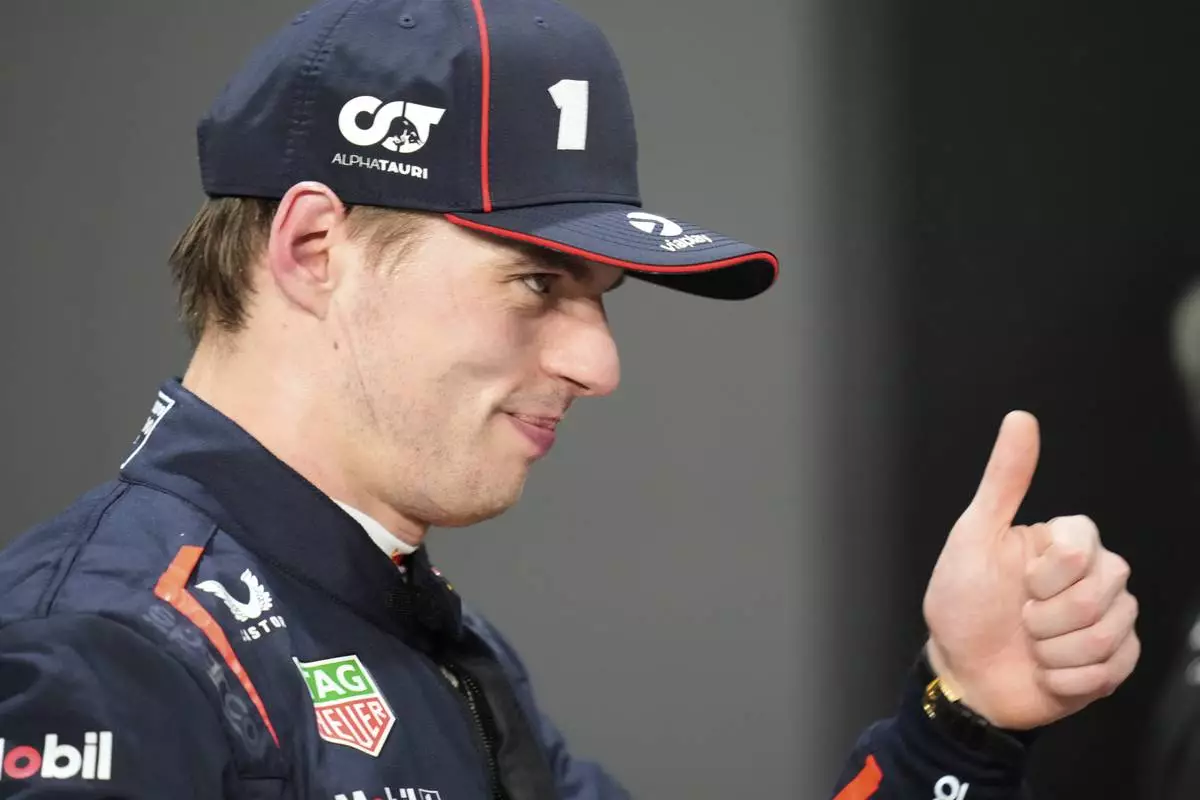 Red Bull driver Max Verstappen of the Netherlands thumbs up after setting the pole position in the qualifying session ahead of the Formula One Saudi Arabian Grand Prix at the Jeddah Corniche Circuit in Jeddah, Saudi Arabia, Saturday, April 19, 2025. (AP Photo/Darko Bandic)