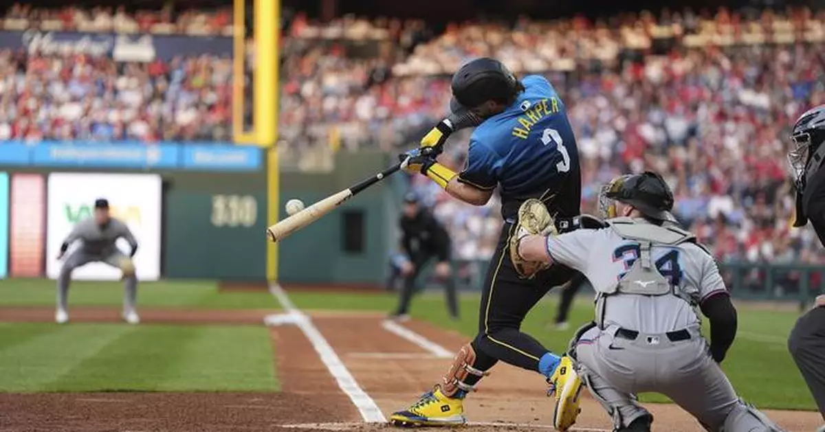 Harper and Schwarber hit home runs as Philadelphia beats Miami 7-2