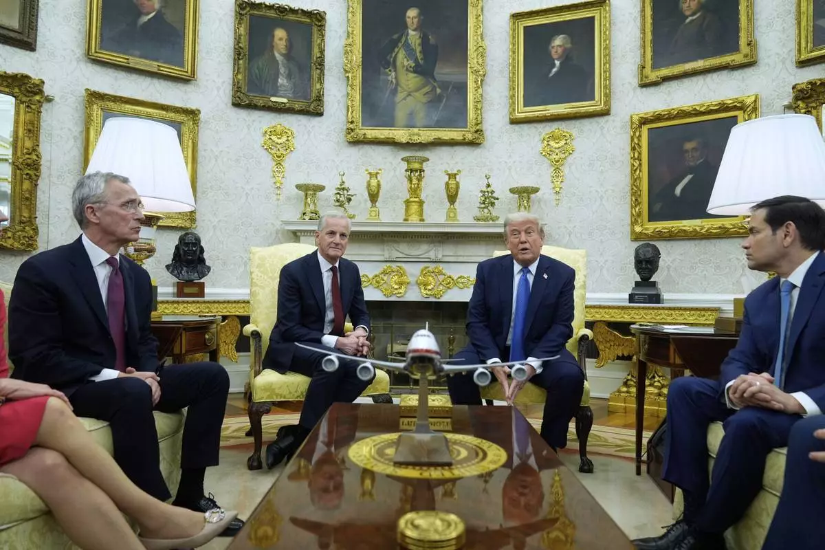 President Donald Trump and Norwegian Prime Minister Jonas Gahr Støre during a bilateral meeting in the Oval Office of the White House, Thursday, April 24, 2025, in Washington. (AP Photo/Mark Schiefelbein)