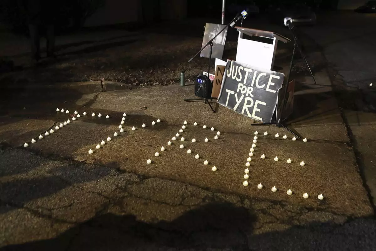 FILE - Candles spell out the name of Tyre Nichols during a candlelight vigil for Nichols on the anniversary of his death, Jan. 7, 2024, in Memphis. (AP Photo/Karen Pulfer Focht, file)