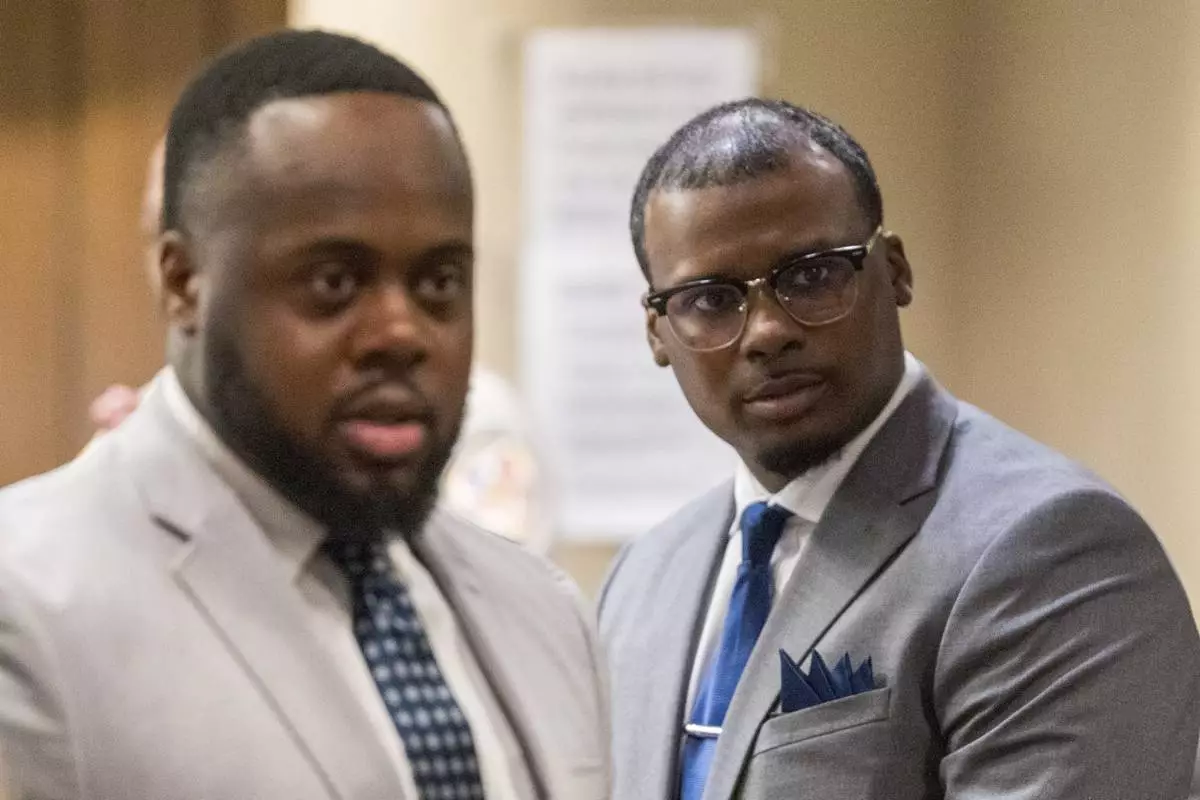 Former Memphis Police Department officers Tadarrius Bean and Justin Smith Jr. look towards the audience in a recess after attorneys argued motions before the state criminal trial for the death of Tyre Nichols at 201 Poplar in Memphis, Tenn., on Monday, April 28, 2025. (Chris Day/Commercial Appeal/USA Today Network, via AP, Pool)