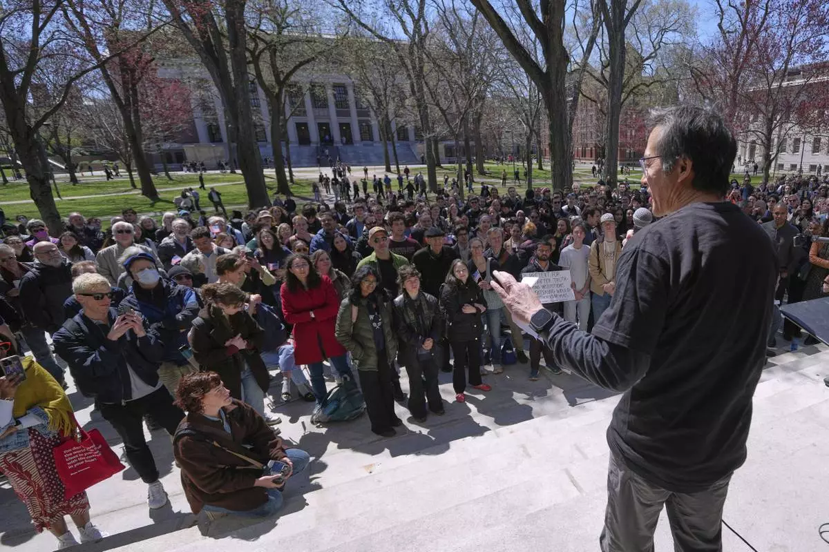 Archon Fung, professor at the John F. Kennedy School of Government, addresses students, faculty and members of the Harvard University community rally, Thursday, April 17, 2025, in Cambridge, Mass. (AP Photo/Charles Krupa)