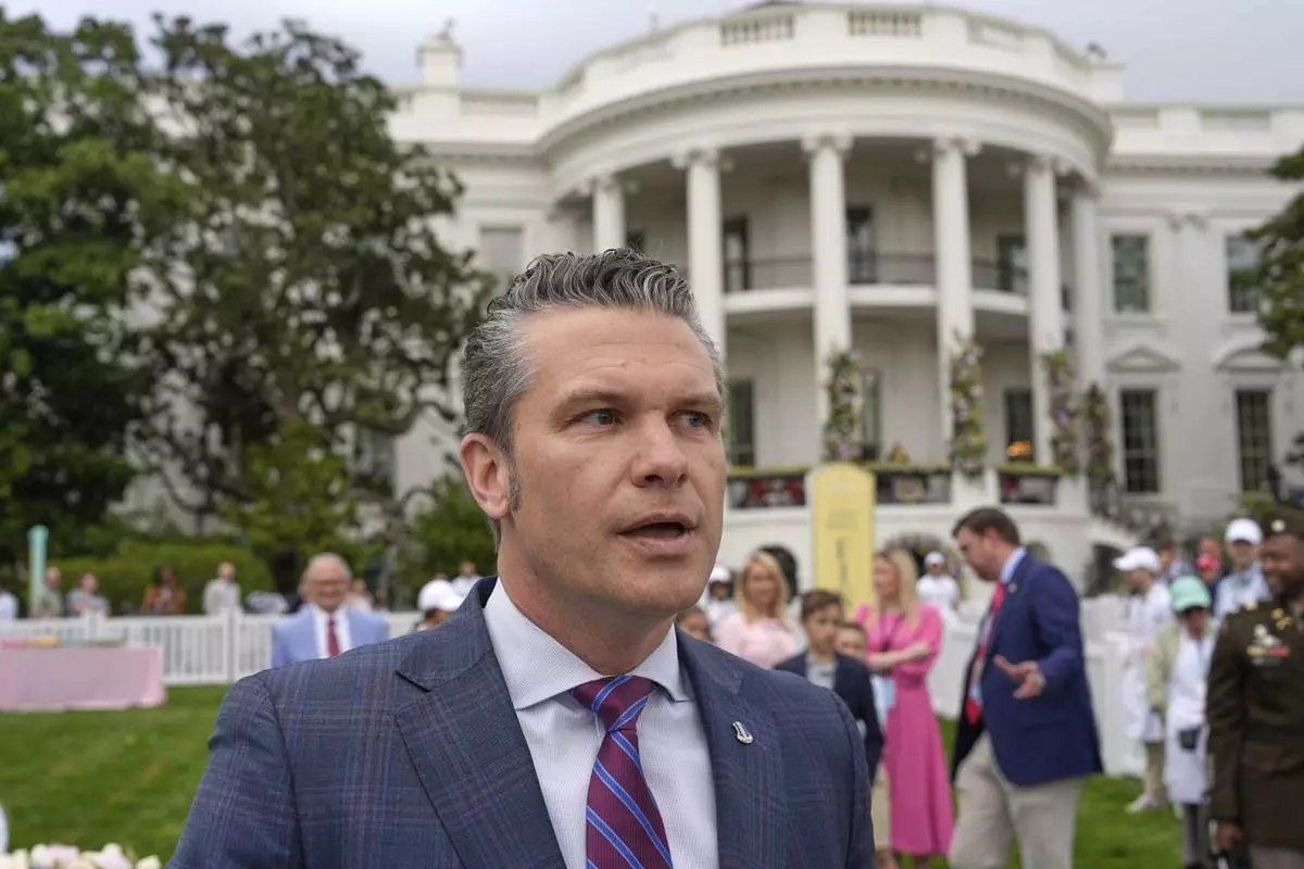 Defense Secretary Pete Hegseth speaks on the South Lawn of the White House before President Donald Trump and first lady Melania Trump participate in the White House Easter Egg Roll Monday, April 21, 2025, in Washington. (AP Photo/Alex Brandon)