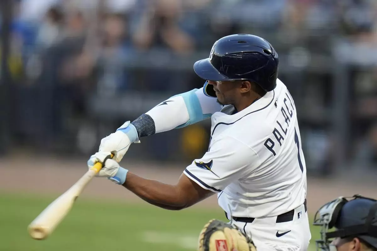 Tampa Bay Rays' Richie Palacios connects for a double off New York Yankees pitcher Will Warren during the second inning of a baseball game Thursday, April 17, 2025, in Tampa, Fla. (AP Photo/Chris O'Meara)