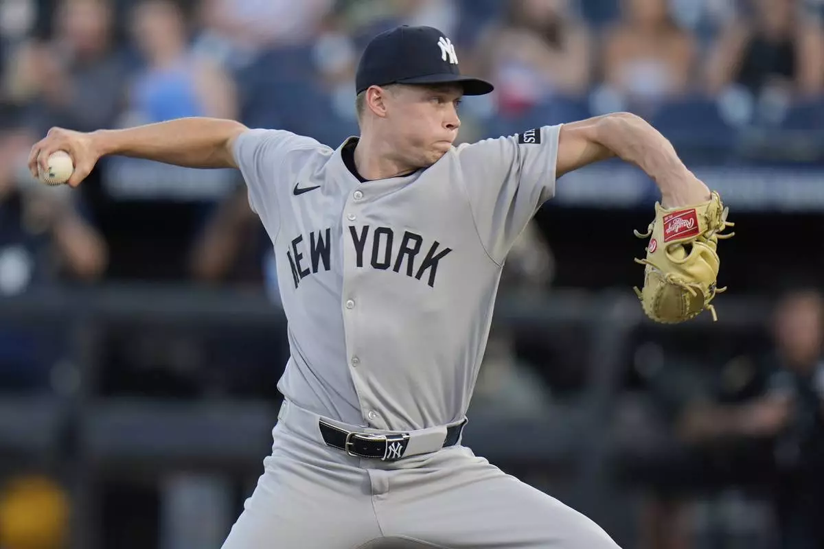 New York Yankees pitcher Will Warren delivers to the Tampa Bay Rays during the first inning of a baseball game Thursday, April 17, 2025, in Tampa, Fla. (AP Photo/Chris O'Meara)