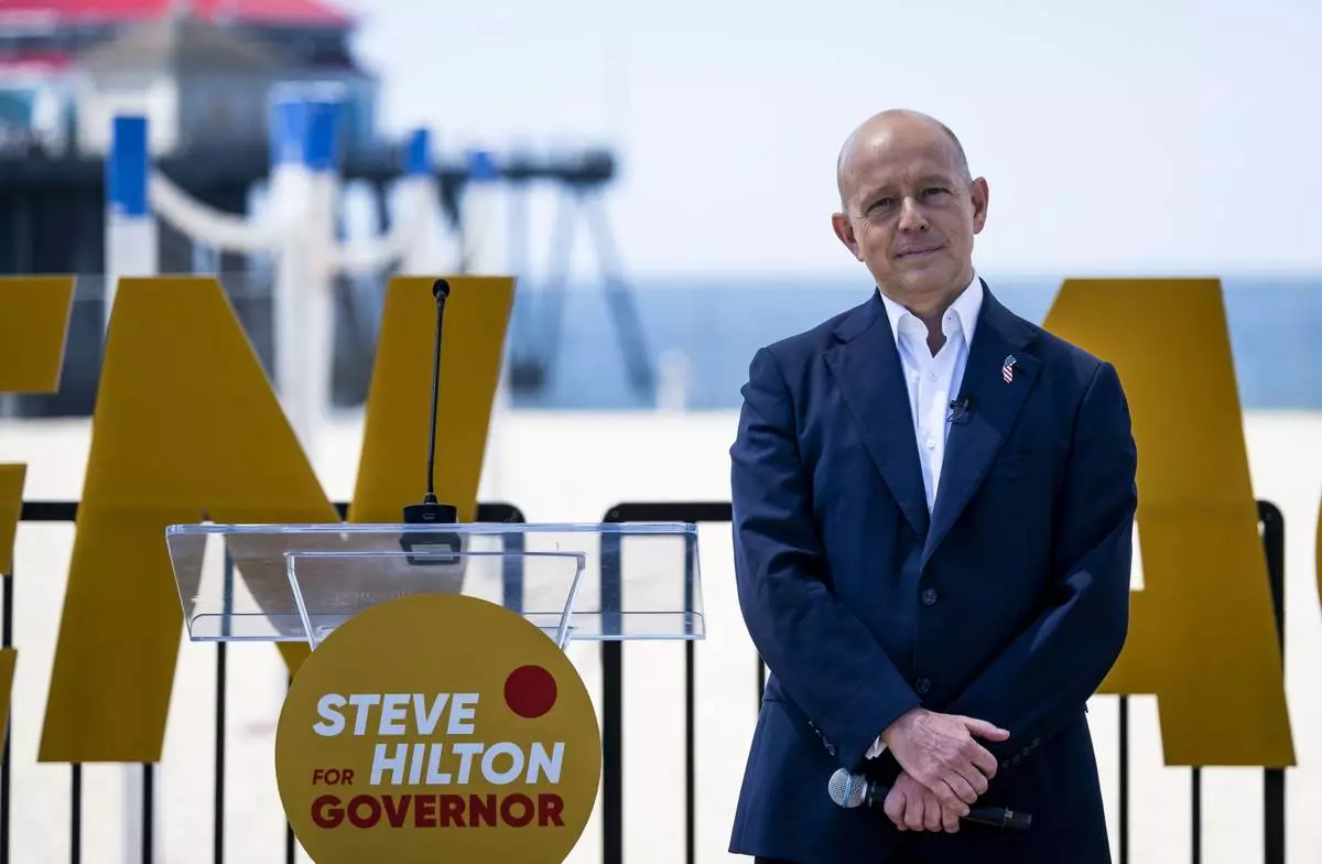 Author and former Fox News host Steve Hilton listens to video presentations as he announced his run for California governor, as a Republican to replace Democrat Gavin Newsom, during an event in Huntington Beach, Calif., Tuesday, April 22, 2025. (Paul Bersebach/The Orange County Register via AP)
